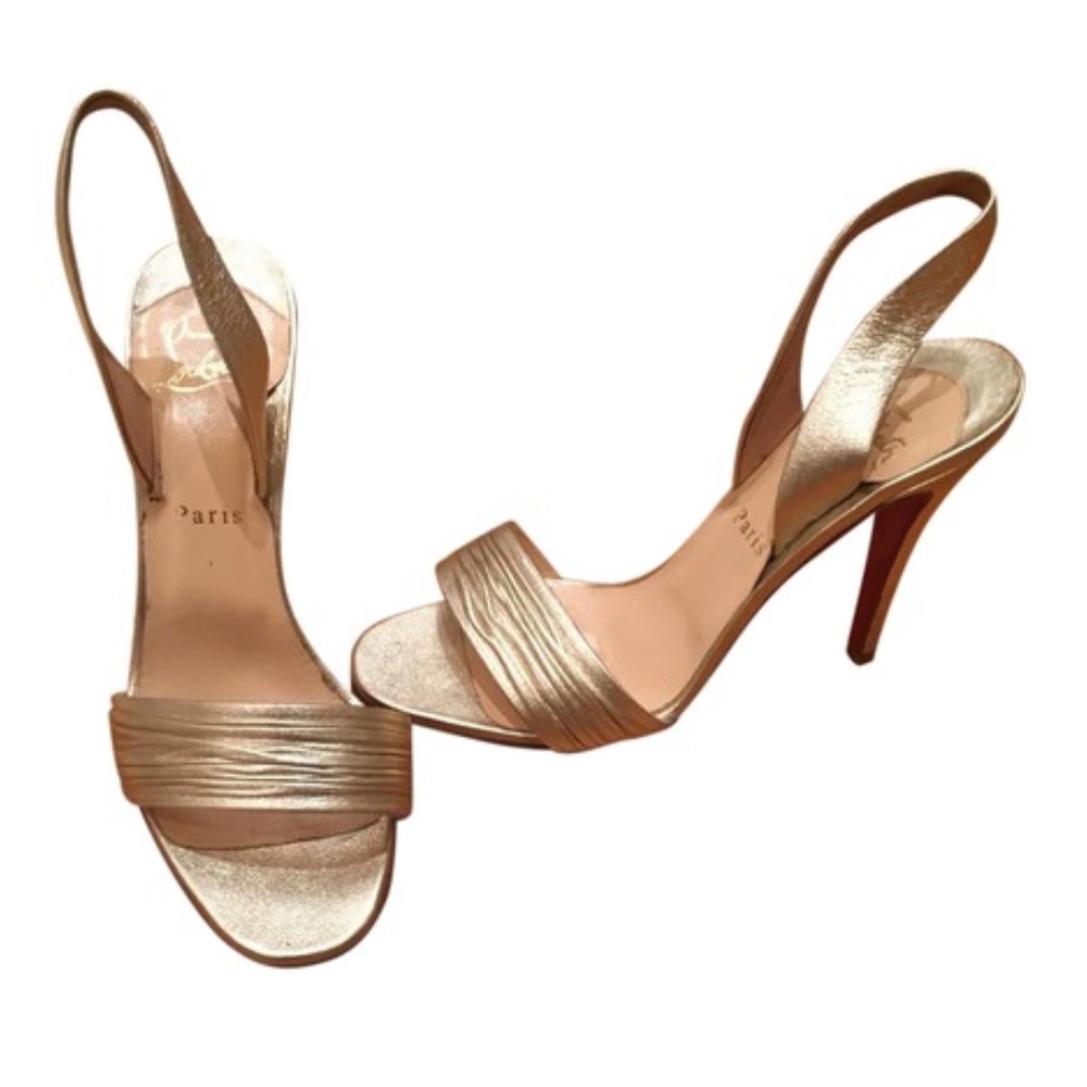 Christian Louboutin Gold heels